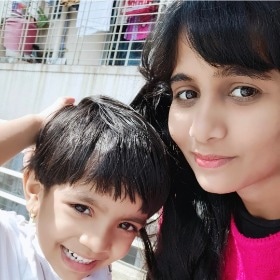 Nisha G